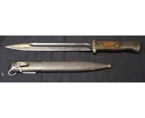 Bayonet: A 3rd Reich Model 1884/98 knife bayonet in its steel scabbard marked 'Cof 1940' (Carl Eikhorn) General good conditio