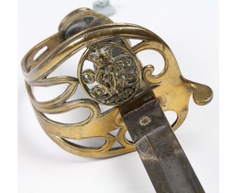 Sword: A Victorian 1845/54 Pattern Infantry Officers Sword. Blade 32". Etched with V.R. Cypher & Crown. Brass guard. Wireboun