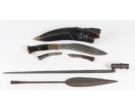 Kukri: 1) Tourist quality Kukri with two small knives in its leather scabbard. 2) Leaf shaped African Spear head possibly Zul