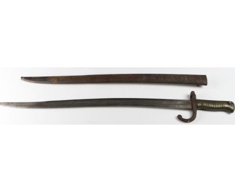 Bayonet: A French Model 1866 Sabre Bayonet in its steel scabbard. Blade marked 'St Etienne June 1868' (Blade tip rounded). Wo