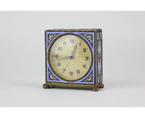 A German enamelled alarm clock, the bronzed circular dial with Arabic numerals, 6.5cm by 7cm