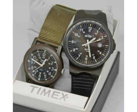 Two Wristwatches comprising a Nite MX10 gents stainless steel quartz wristwatch in black with signed black dial, white Arabic