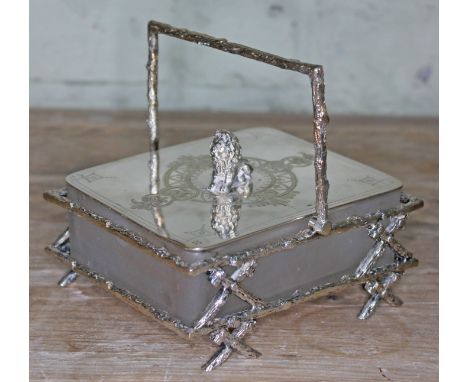 A Victorian silver plated sardine dish constructed from imitation logs, engraved lid with lion finial and frosted glass dish,