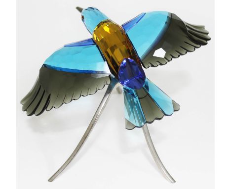A Swarovski Paradise Birds roller bird on metal stand, height 17cm.  Condition - good, no damage/repair, minor wear.