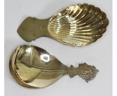 Two hallmarked silver gilt caddy spoons, length 7.5cm.  