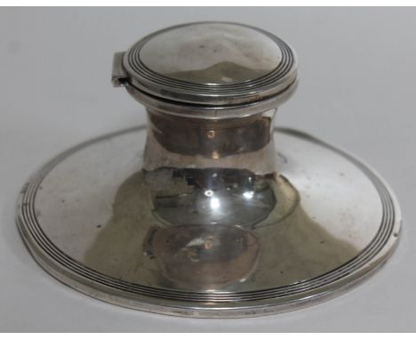 A hallmarked silver capstan inkwell, diam. 15cm.  