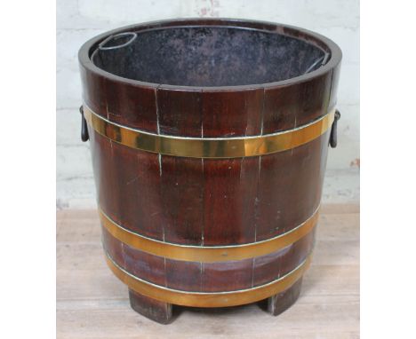 A brass bound planter of barrel form, height 40cm.  