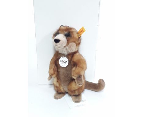 A Steiff meerkat Rico with ear tag numbered 064425, labels and box. 