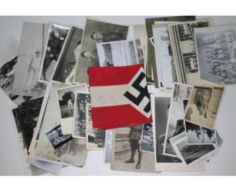 Nazi ephemera comprising a Hitler Youth arm band and a collection of contemporary military and earlier family photographs, th