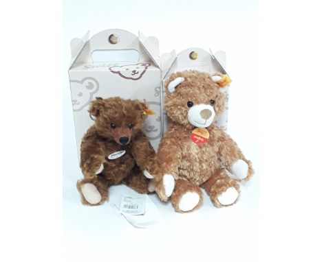 Two Steiff bears numbers 004865 and 022791, each with ear tag, labels and boxes.
