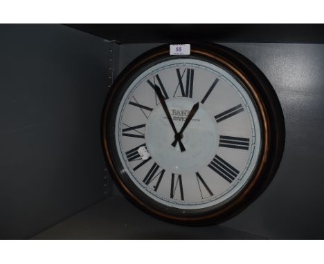A vintage station style wall clock.