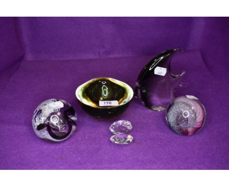 A selection of art glass paper weights and tropical fish figure