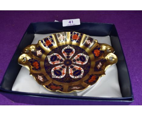 A Royal Crown Derby pin or trinket dish on red back stamp with box.