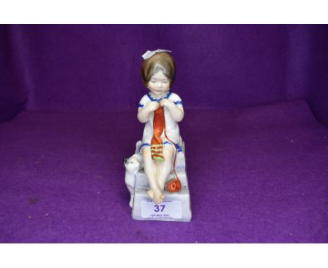 A Royal Worcester figurine entitled Saturdays child works hard for a living.