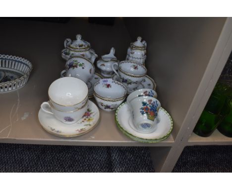 A selection of  teacups and saucers including Spode Rockingham tea set