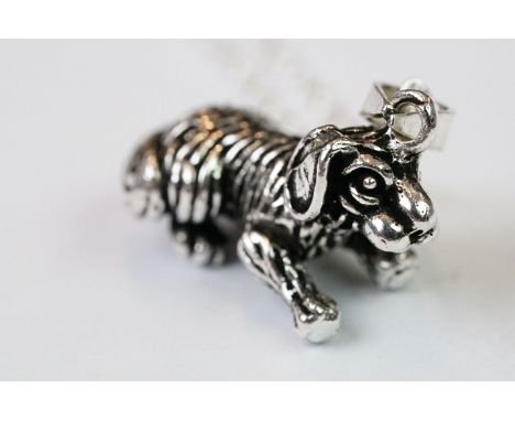 Silver articulated dog pendant on silver chain 