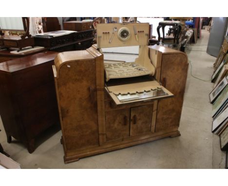 Art Deco Walnut and Burr Walnut Cocktail Cabinet, the raised centre with hinged lid and drop down front opening and lifting t