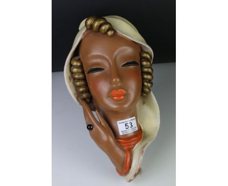 Goldscheider Pottery Face Mask of a Woman, incised number to base 7813 13, 33cms high 