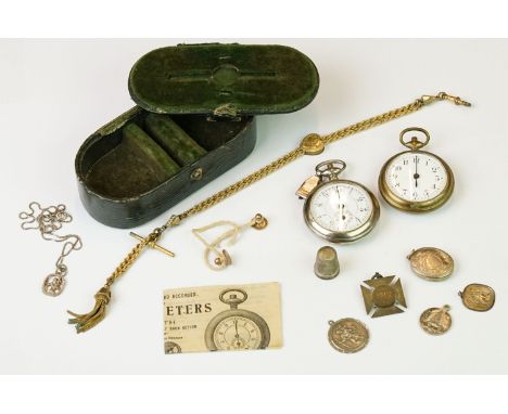 Two vintage pocket watches together with an Albert chain and a small group of silver pendants. 