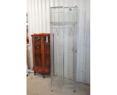 20th century Galvanised Steel Mesh Two Section Locker, each section with shelf above a hanging rail with two hangers, 200cm h