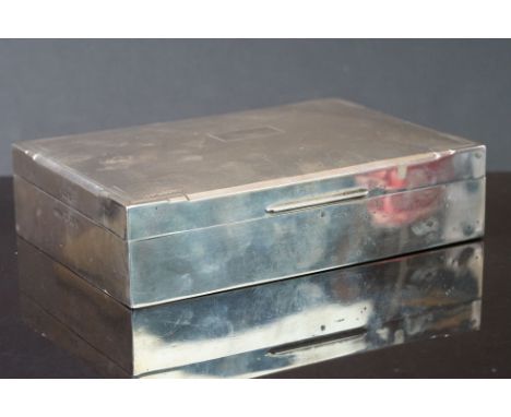 A fully hallmarked sterling silver cigarette box with engine turned Art Deco decoration, maker marked for Harman Brothers and