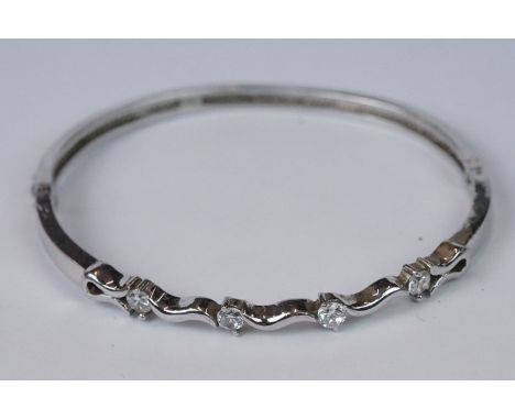Silver and CZ ladies bangle, set with four CZs 