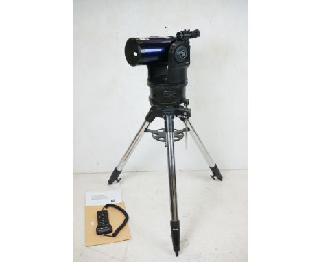 A Meade Astro Telescope complete with tripod and instruction manual. 