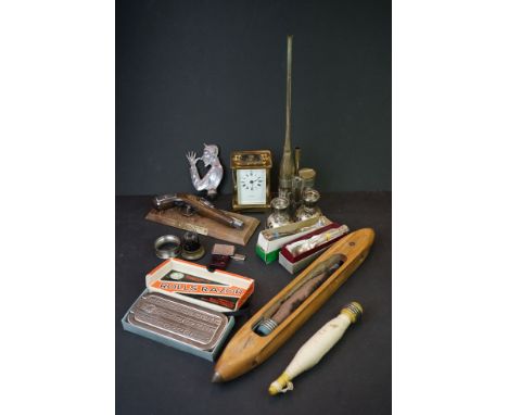 A group of mixed collectables to include a carriage clock, loom shuttle, silver candlesticks etc.. 
