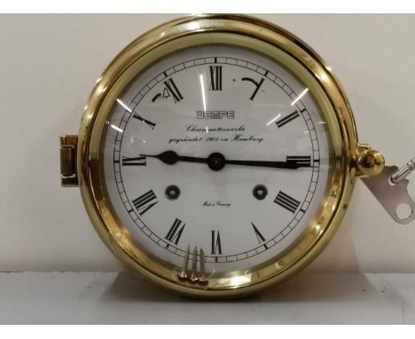 A German Wempe brass chronometer bulk head clockLocation: SR 