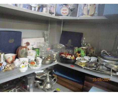 A quantity of table glass, ornaments and silver plate to include a Nao figurine, part tea sets, and other items 