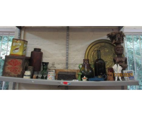 A mixed lot to include an Acton Vale and Dagenham bus route sign, Sandeman Port glass bottle, wooden carved tribal art figure