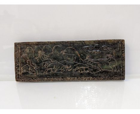 A dark green jade coloured plaque carved with a hunting scene to each side, 20cm wideLocation: LAF 