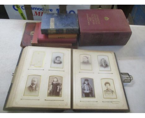 A late 19th/early 20th century photograph album together with mixed books to include 'Old Curiosity Shop' by Dickens, togethe