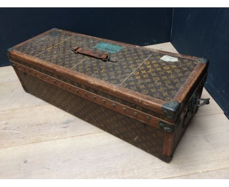 Louis Vuitton monogrammed trunk specially made for the Encyclopedia Britannica, stamped inside the lid No.209749, 30H x 90W c