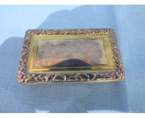 William IV silver gilt snuff box, maker 'T.E. London' 1835, of rectangular outline with foliate chased border enclosing a now