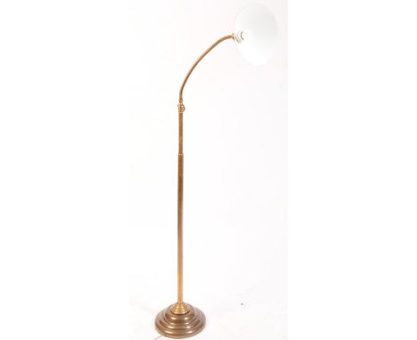 A vintage 20th century circa 1950s floor standing standard lamp. Light fixing and shade to top, with goose neck, on a adjusta