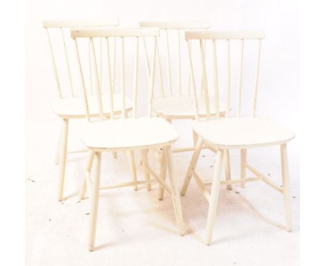 Farstrup Furniture Mobler - A set of four retro 20th century stick back dining chairs. In a white colourway, having spindle b