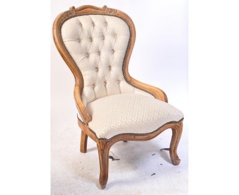 Victorian 19th century spoon back armchair. With mahogany stripped show wood, white upholstered fabric with stud work border.