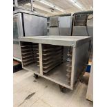 stainless equipment stand w/ dual tray racks below, on casters