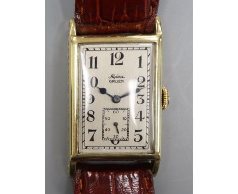 A gentleman's 1930's 14k Alpina Gruen manual wind wrist watch, with rectangular Arabic dial and subsidiary seconds, on later 