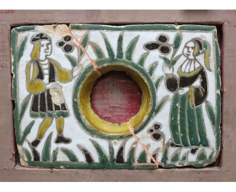 A 15th century framed Dutch? tile 19.5 x 27.5cm including frame
