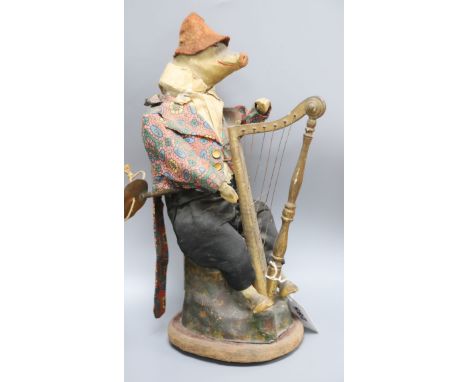 A French automaton of a pig playing a harp, late 19th century