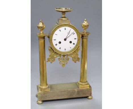 An ormolu portico clock with silk suspension, Louis XVI style H.38cm