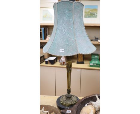 A gilt metal table lamp