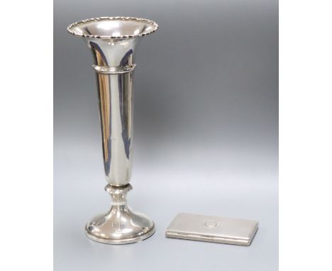 A Victorian engine turned silver card purse, G. Wheeler &amp; Co, Birmingham, 1860, 83mm and a silver spill vase.