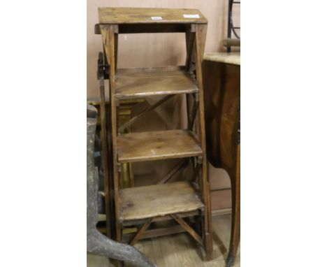 A Victorian patent pine four tread step ladder H.76cm