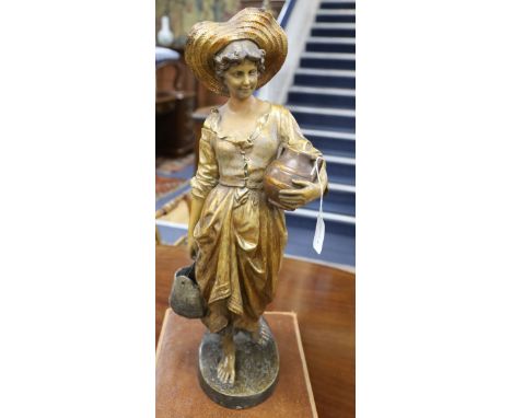 A Goldscheider figure of a Dutch girl carrying a water jug H.66cm