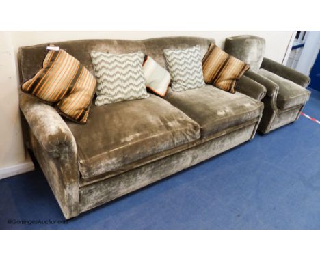   A grey velvet two seat sofa bed, approximately 191 cm wide and a matching armchair, various scatter cushionsProvenance - a 