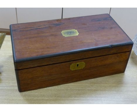   Two brass framed portraits and a portrait miniature and a mahogany writing slope, width 50cm