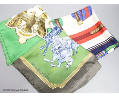   Three vintage Hermes silk scarves, 'Scarabee et Pectoraux' (gold, green, white), 'Carrousel' (green ground), and 'Sangles' 